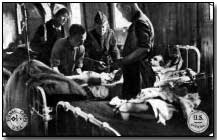 Dressing a wound at US Base Hospital #18